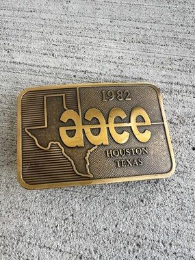 Vintage 1982 AACE Houston Texas Belt Buckle Brass Tone Conference Souvenir